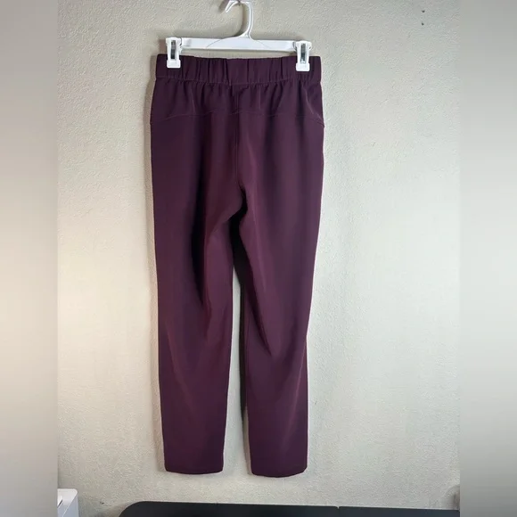 Lululemon On The Fly Pant Woven 27" size 4 maroon - Picture 3 of 6